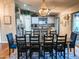 Bright kitchen features an island, ample cabinetry, and a spacious dining area at 8114 E Clarendon Ave, Scottsdale, AZ 85251