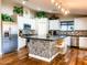 Modern kitchen with stainless steel appliances and island at 8114 E Clarendon Ave, Scottsdale, AZ 85251