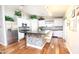 Modern kitchen with stainless steel appliances and an island at 8114 E Clarendon Ave, Scottsdale, AZ 85251