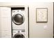 Convenient laundry area with stackable washer and dryer at 8114 E Clarendon Ave, Scottsdale, AZ 85251