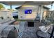 Outdoor patio with comfortable seating and fire pit at 8114 E Clarendon Ave, Scottsdale, AZ 85251