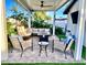 Relaxing patio with comfortable seating and fire pit at 8114 E Clarendon Ave, Scottsdale, AZ 85251