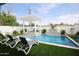 Relaxing backyard oasis with a sparkling pool and pergola at 8114 E Clarendon Ave, Scottsdale, AZ 85251