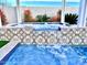 Close-up of spa waterfall and patterned tile at 8114 E Clarendon Ave, Scottsdale, AZ 85251