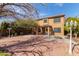 Two story home with backyard patio and fire pit at 835 E Marigold Pl, San Tan Valley, AZ 85143