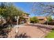 Two story home with backyard patio and fire pit at 835 E Marigold Pl, San Tan Valley, AZ 85143