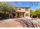 Two story home with backyard patio and fire pit at 835 E Marigold Pl, San Tan Valley, AZ 85143