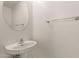 Small bathroom with pedestal sink and chrome accents at 835 E Marigold Pl, San Tan Valley, AZ 85143
