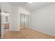Bedroom with mirrored closet doors and carpet at 835 E Marigold Pl, San Tan Valley, AZ 85143