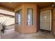 Front entrance with security door and sidelights at 835 E Marigold Pl, San Tan Valley, AZ 85143