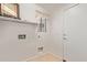 Laundry room with built-in shelving and exterior access at 835 E Marigold Pl, San Tan Valley, AZ 85143