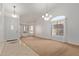 Bright living room with tile floors and neutral color scheme at 835 E Marigold Pl, San Tan Valley, AZ 85143