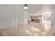 Bright living room with tile floors and kitchen island view at 835 E Marigold Pl, San Tan Valley, AZ 85143