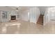 Living room with fireplace, tile floors, and lots of natural light at 835 E Marigold Pl, San Tan Valley, AZ 85143