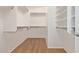 Large walk-in closet with ample shelving and hanging space at 835 E Marigold Pl, San Tan Valley, AZ 85143