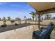 Relaxing patio furniture overlooking golf course at 10502 E Spring Creek Rd, Sun Lakes, AZ 85248