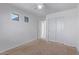Bright bedroom with double door closet and window at 10760 W Monte Vista Rd, Avondale, AZ 85392