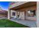Covered patio with two teal chairs at 10760 W Monte Vista Rd, Avondale, AZ 85392