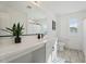 Modern bathroom with double vanity and shower at 10994 W Mckinley St, Avondale, AZ 85323