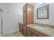 Updated bathroom with double vanity and granite countertop at 12433 W Fieldstone Dr, Sun City West, AZ 85375