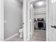 Large walk-in closet with ample shelving and hanging space at 15253 W Pasadena Dr, Surprise, AZ 85374