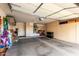 Two-car garage with extra storage cabinets at 15253 W Pasadena Dr, Surprise, AZ 85374