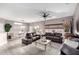 Elegant living room with leather furniture and hardwood floors at 15253 W Pasadena Dr, Surprise, AZ 85374