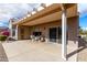 Relaxing covered patio with seating area at 15253 W Pasadena Dr, Surprise, AZ 85374
