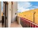 Private balcony overlooking landscaped courtyard with red flowers at 16450 E Ave Of The Fountains -- # 23, Fountain Hills, AZ 85268