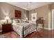 Light and airy bedroom with ensuite access and hardwood floors at 16450 E Ave Of The Fountains -- # 23, Fountain Hills, AZ 85268