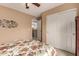 Bedroom with a double door closet and access to the loft at 16450 E Ave Of The Fountains -- # 23, Fountain Hills, AZ 85268