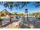 Community park with playground equipment and shade structures at 16450 E Ave Of The Fountains -- # 23, Fountain Hills, AZ 85268