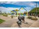 Community park with playground, shaded areas, and sculptures at 16450 E Ave Of The Fountains -- # 23, Fountain Hills, AZ 85268