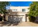 Two-story home with attached garage and desert landscaping at 16450 E Ave Of The Fountains -- # 23, Fountain Hills, AZ 85268