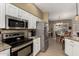 Well-equipped kitchen with granite countertops and stainless appliances at 16450 E Ave Of The Fountains -- # 23, Fountain Hills, AZ 85268