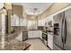 Modern kitchen featuring granite counters and stainless steel appliances at 16450 E Ave Of The Fountains -- # 23, Fountain Hills, AZ 85268