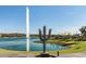 Lake with fountain and a metal cactus sculpture at 16450 E Ave Of The Fountains -- # 23, Fountain Hills, AZ 85268