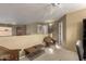 Spacious loft area with two wicker chairs and a small table at 16450 E Ave Of The Fountains -- # 23, Fountain Hills, AZ 85268
