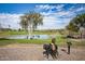 Scenic pond with statue and landscaping, near community clubhouse at 16450 E Ave Of The Fountains -- # 23, Fountain Hills, AZ 85268