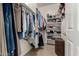 Large walk-in closet with shelving and hanging space at 16450 E Ave Of The Fountains -- # 23, Fountain Hills, AZ 85268