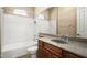 Clean bathroom with granite vanity and tiled shower/tub combo at 1807 W Sierra Sunset Trl, Phoenix, AZ 85085