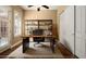 Bright home office with built-in shelving and hardwood floors at 1807 W Sierra Sunset Trl, Phoenix, AZ 85085