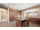 Spacious kitchen with island, granite countertops, and ample cabinetry at 1807 W Sierra Sunset Trl, Phoenix, AZ 85085