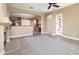 Open living room with views into kitchen and access to other rooms at 1807 W Sierra Sunset Trl, Phoenix, AZ 85085