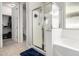 Main bathroom with shower, tub, and walk-in closet at 18254 W Via Montoya Dr, Surprise, AZ 85387