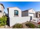 White stucco home with a gated side yard at 18254 W Via Montoya Dr, Surprise, AZ 85387