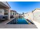 Relaxing pool area with patio furniture and a covered patio at 18254 W Via Montoya Dr, Surprise, AZ 85387