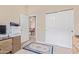 Home office features a printer, file cabinet, and view into dining area at 2207 W Hayward Ave, Phoenix, AZ 85021