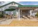 Relaxing patio area with seating and covered pergola at 2207 W Hayward Ave, Phoenix, AZ 85021