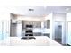 Updated kitchen with stainless steel appliances and ample counter space at 22270 W Skinner Rd, Wittmann, AZ 85361